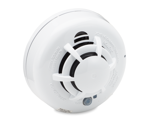 Monitored carbon monoxide detector on a wall